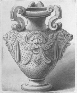 Roman bronze vase with grotesque heads